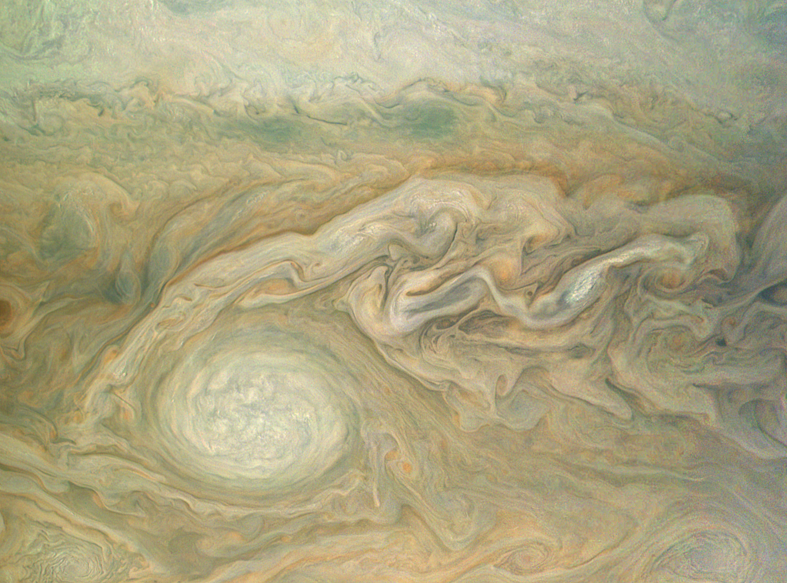 Jupiter&#039;s Little Red Spot takes center stage in this enhanced color photo from NASA&#039;s Juno spacecraft in orbit around the planet. The image was taken Feb. 2, 2017 (and released May 18) and was processed by citizen scientist Bjorn Jonsson using data from J