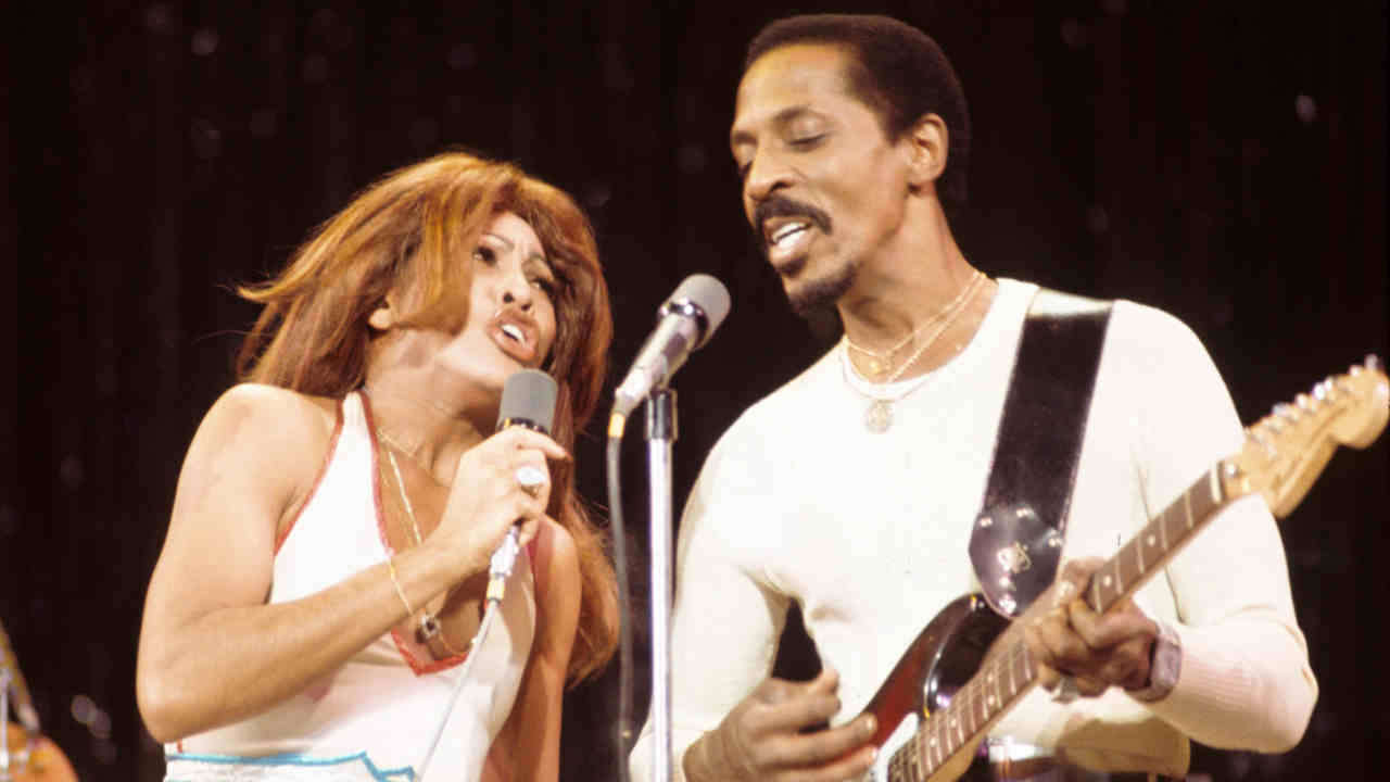 Tina Turner and Ike Turner performing onstage in 1973