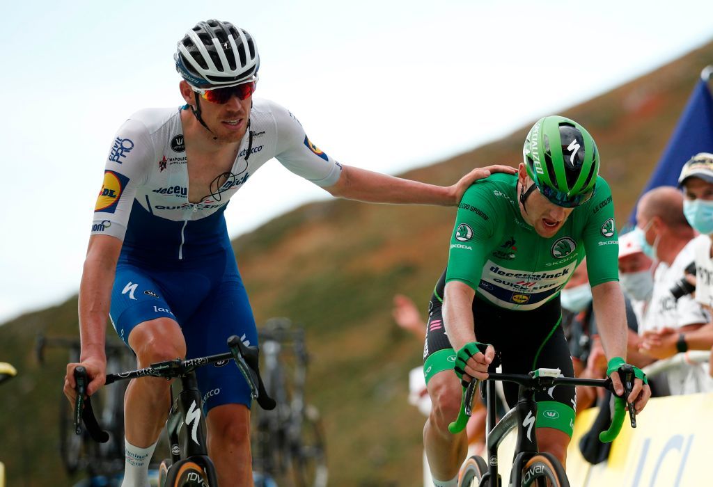 Team Deceuninck rider Irelands Sam Bennett wearing the best sprinters green jersey R arrives with Team Deceuninck rider Belgiums Dries Devenyns at the finish line of the 13th stage of the 107th edition of the Tour de France cycling race 191 km between ChatelGuyon and Puy Mary on September 11 2020 Photo by BENOIT TESSIER POOL AFP Photo by BENOIT TESSIERPOOLAFP via Getty Images