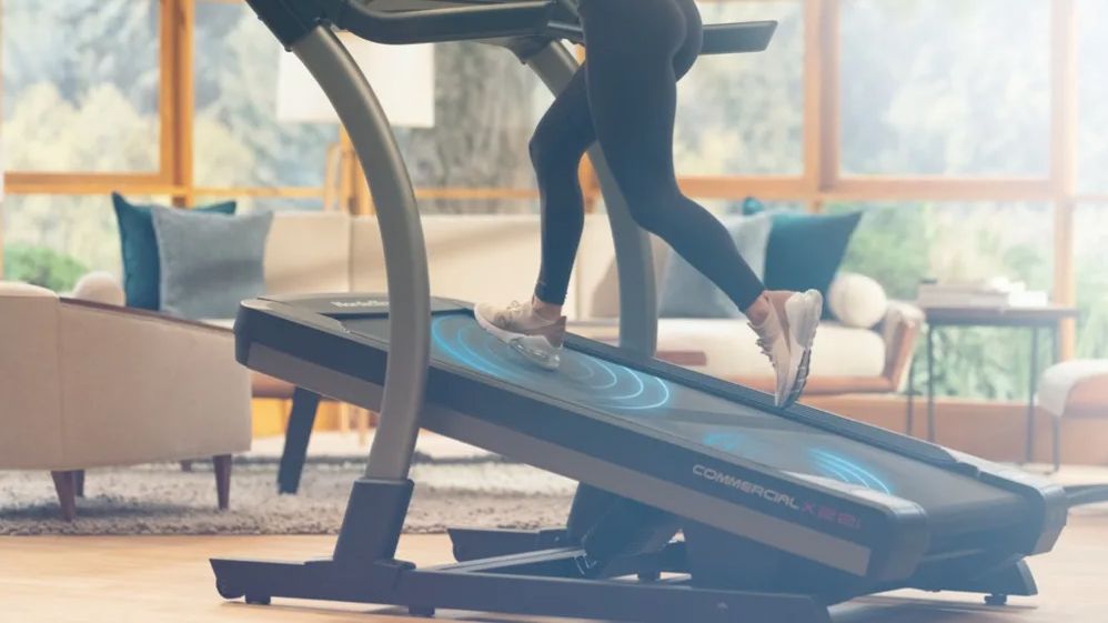 NordicTrack X22i treadmill in living room being used