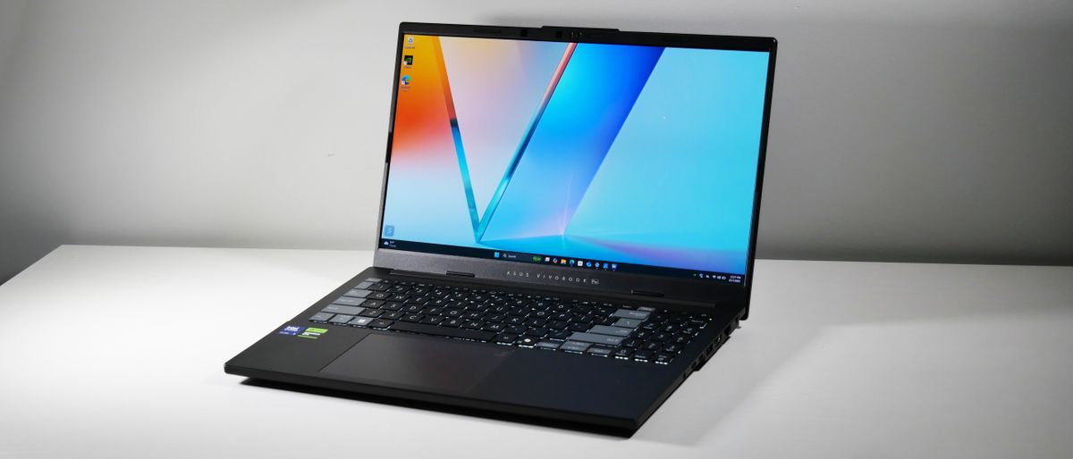 Asus Vivobook Pro 15 (N6506, 2025) open at an angle on a white table.