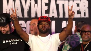 Floyd Mayweather Jr does the peace and love sign during the Weigh-Ins ahead of his exhibition fight with John Gotti III at Big Bola Casino on August 24, 2024 in Mexico City, Mexico.