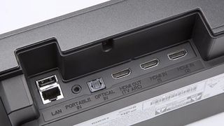 The connections at the rear of a soundbar, including three HDMI sockets, one of which is labelled 'TV ARC'