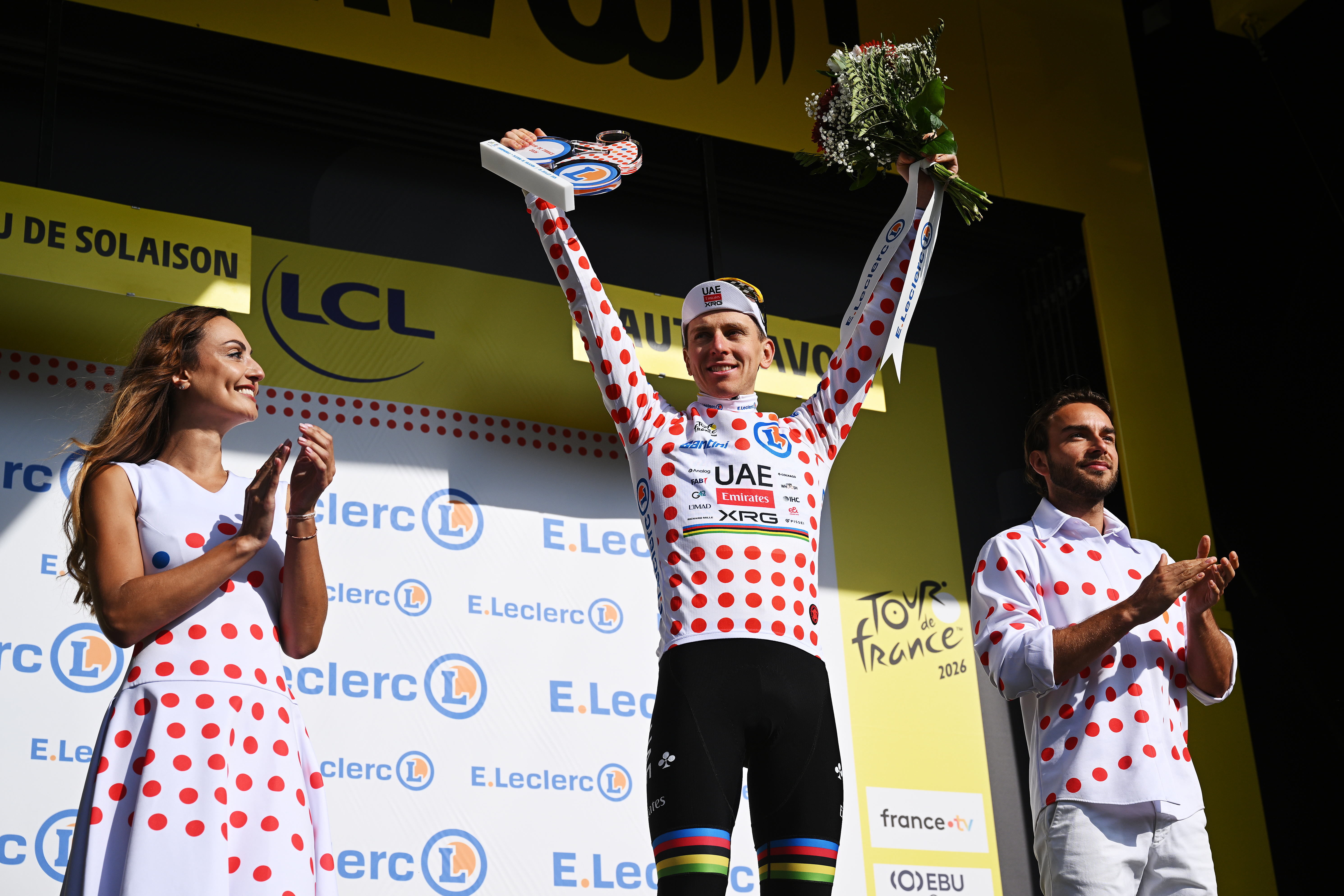 PLATEAU DE SOLAISON, FRANCE - JULY 19: Tadej Pogacar of Slovenia and UAE Team Emirates - XRG celebrates at podium as Polka Dot Mountain Jersey winner during the 113th Tour de France 2026, Stage 15 a 183.9km a 155.3km stage from Champagnole to Plateau de Solaison 1501m / #UCIWT / on July 19, 2026 in Plateau de Solaison, France. (Photo by Dario Belingheri/Getty Images)