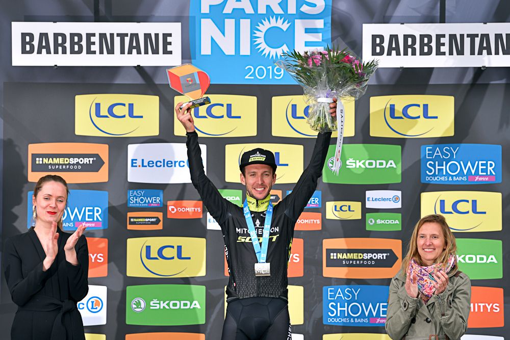 Simon Yates on the Paris-Nice podium after winning the time trial