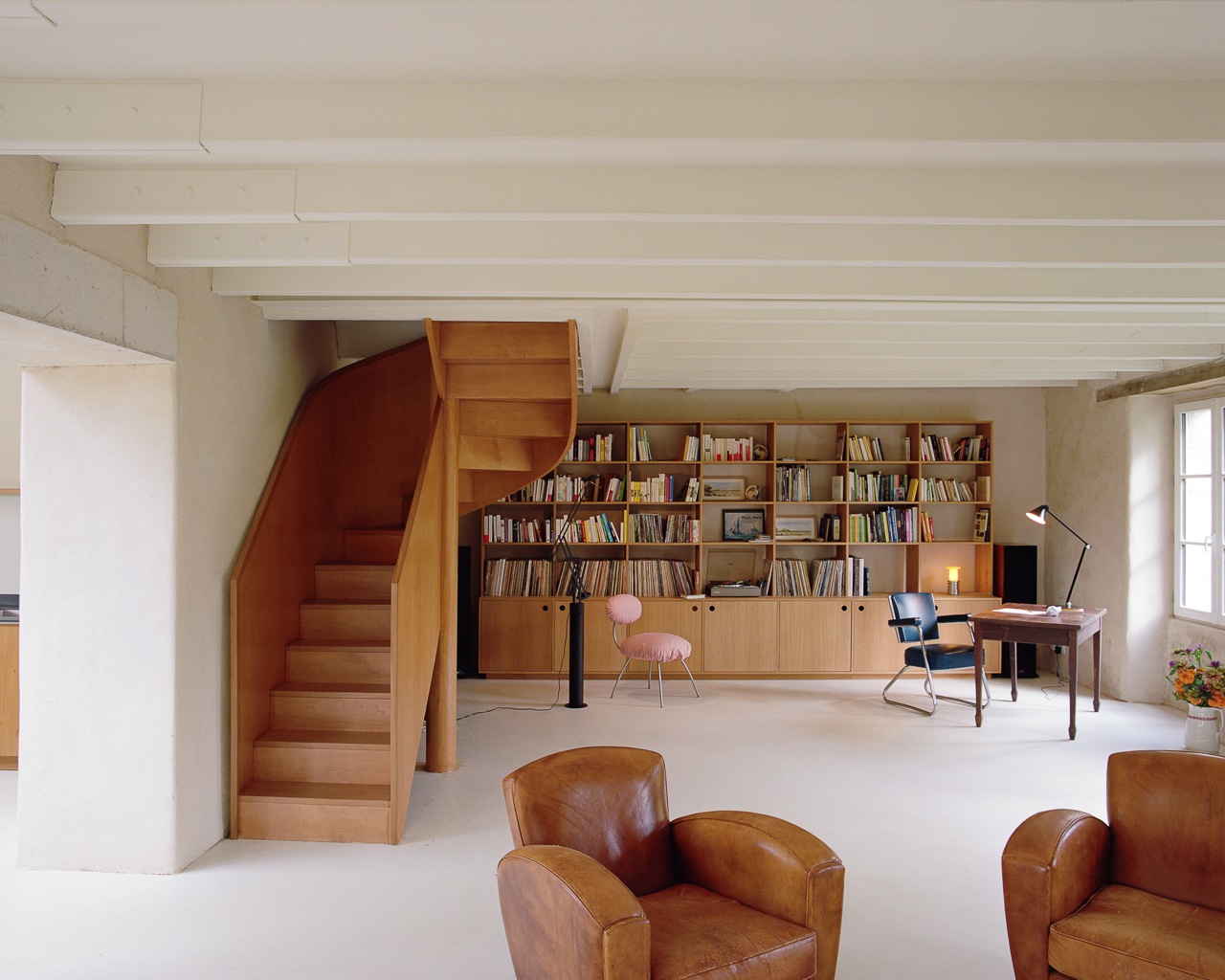 The staircase and library are a focal point of the ground floor refurbishment