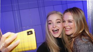 Facial expression, Selfie, Smile, Blond, Fun, Yellow, Photography, Electronic device, Technology, Gadget,