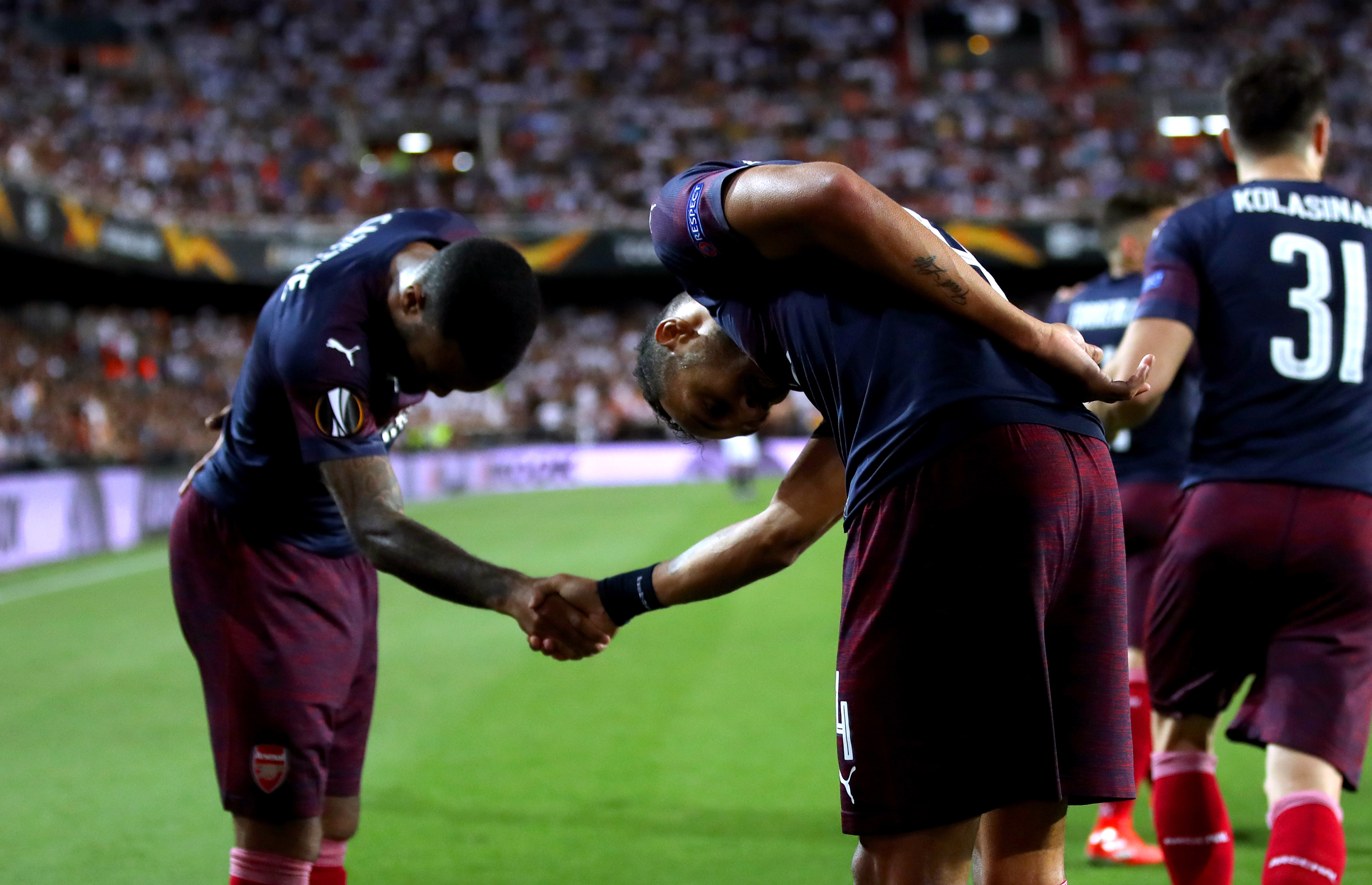 Arsenal’s Pierre-Emerick Aubameyang, right, and Alexandre Lacazette sent their side through to the Europa League final in Valencia