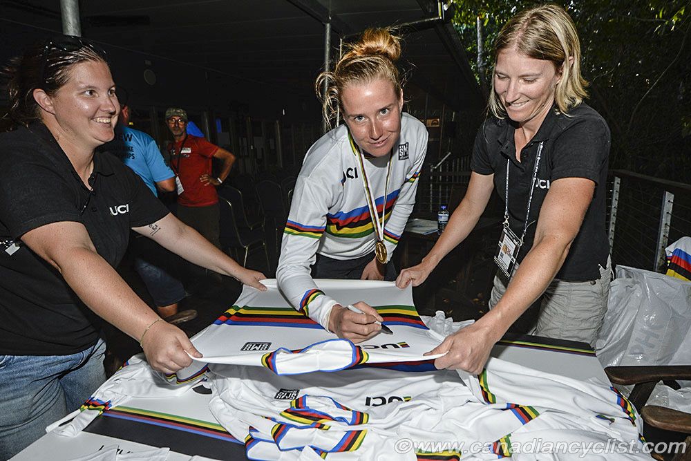 One of the duties of a new world champion is to sign jerseys for sponsors