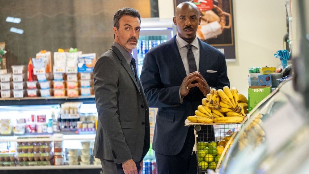 Reid Scott as Det. Vincent Riley and Mehcad Brooks as Det. Jalen Shaw in a store in Law &amp; Order season 24 