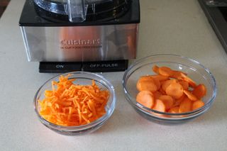 Two bowls of carrots, one sliced and one grated