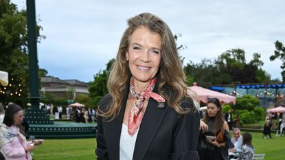 Annabel Croft in a necktie and a suit