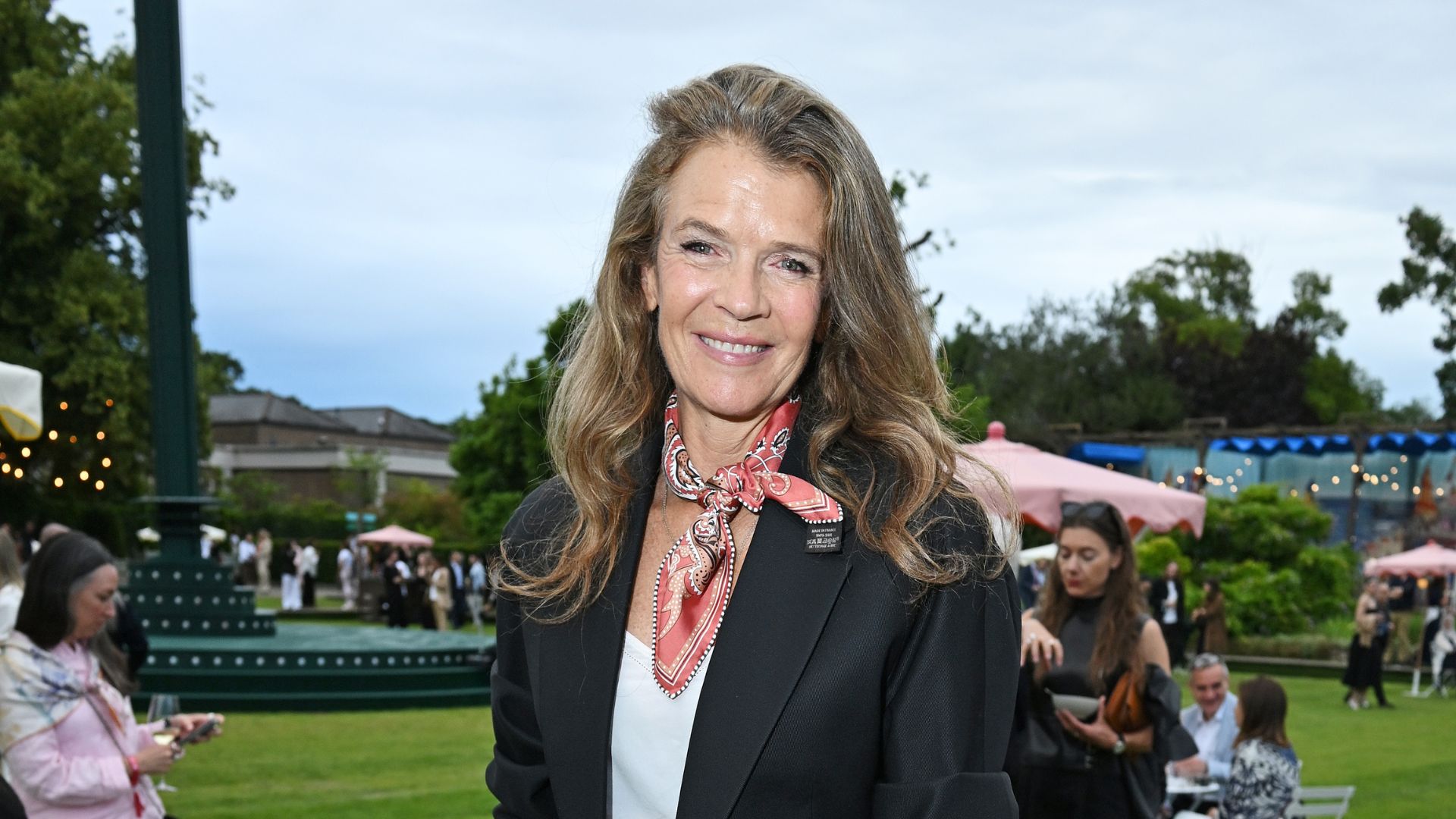 Annabel Croft in a necktie and a suit