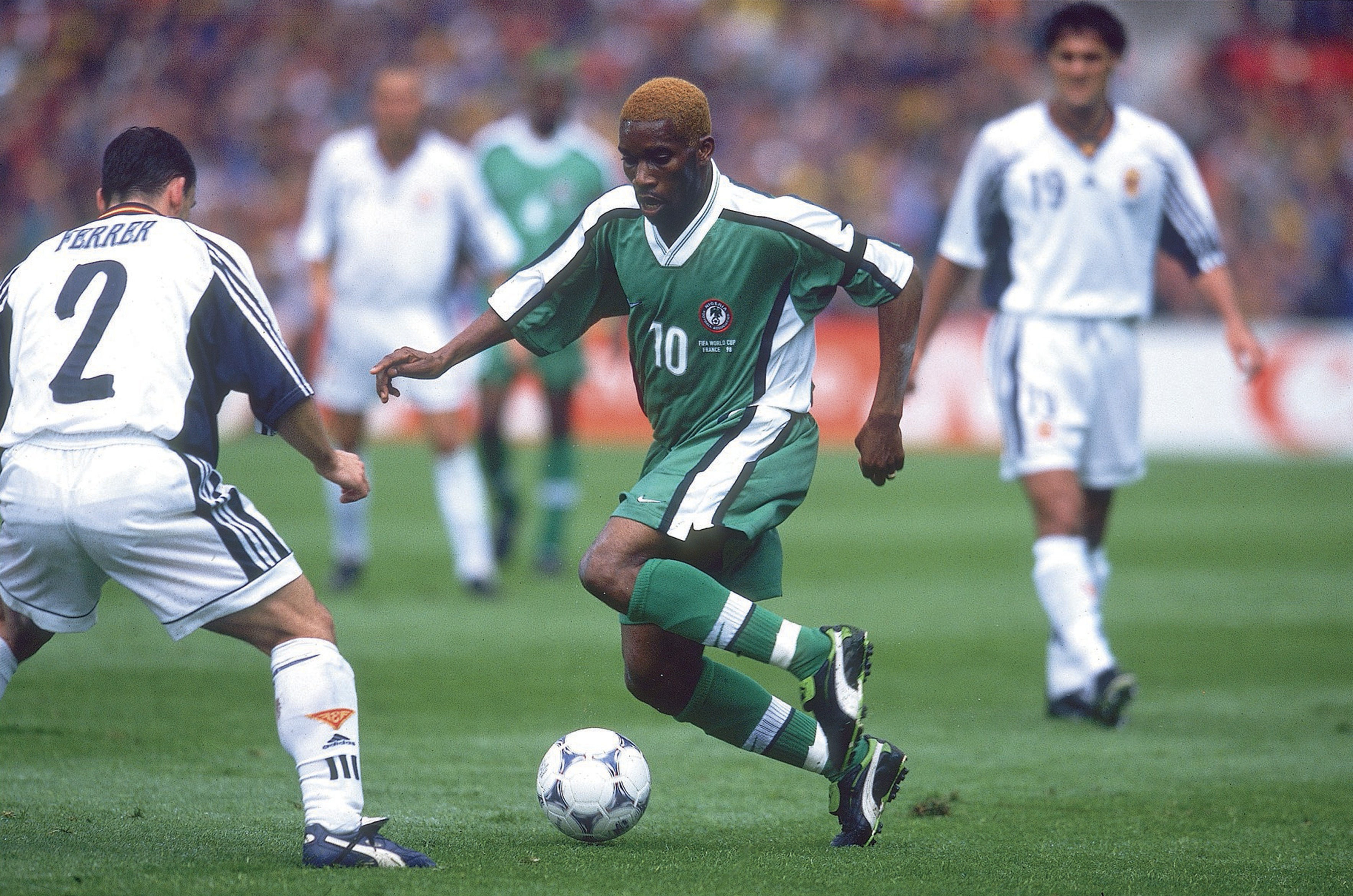 Jay-Jay Okocha on the ball for Nigeria against Spain at the 1998 World Cup.