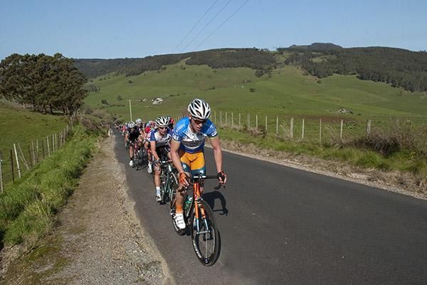Nathan Earle (Genesys Wealth Advisers) leads the peloton up the steep climb at Gunns Plains.