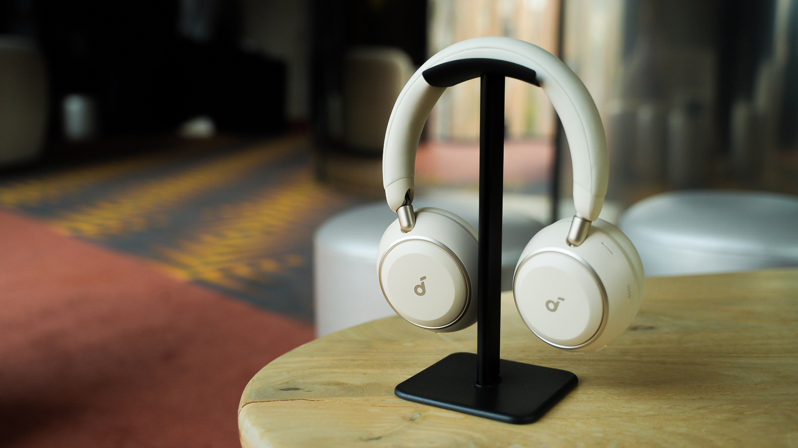 The Soundcore Space 2 headphone in a showroom on a headphone stand