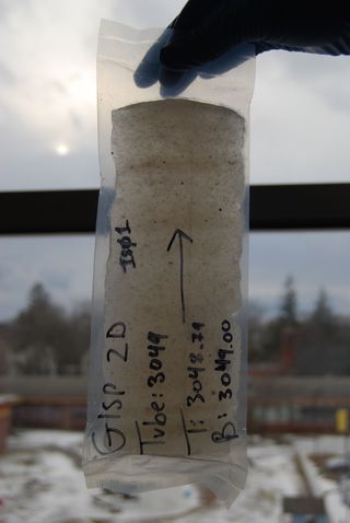 Piece of the GISP2 ice core showing silt and sand embedded in ice. Soon after this picture was taken, the ice was crushed in the University of Vermont clean lab and the sediment was isolated for analysis.