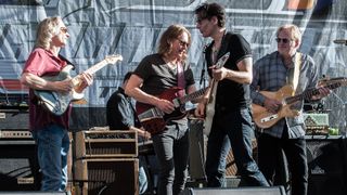 L-R: Sonny Landreth, Robben Ford, Steve Vai and John Jorgenson performing in 2015. Note the Dumble Overdrive Special amp between Landreth and Ford.