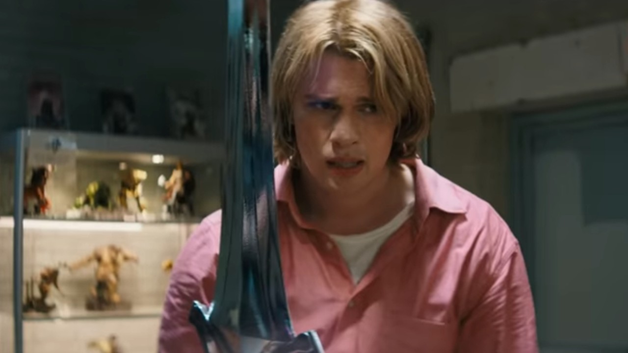 Nicholas Galitzine looking worried with a sword in Masters of the Universe.