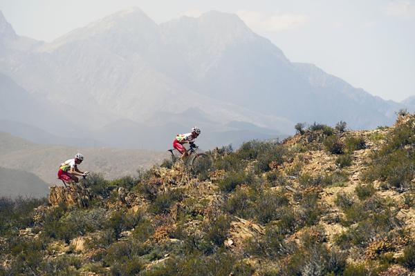 Stage winners Christoph Sauser and Burry Stander of Songo Specialized by DCM climb during the time trial