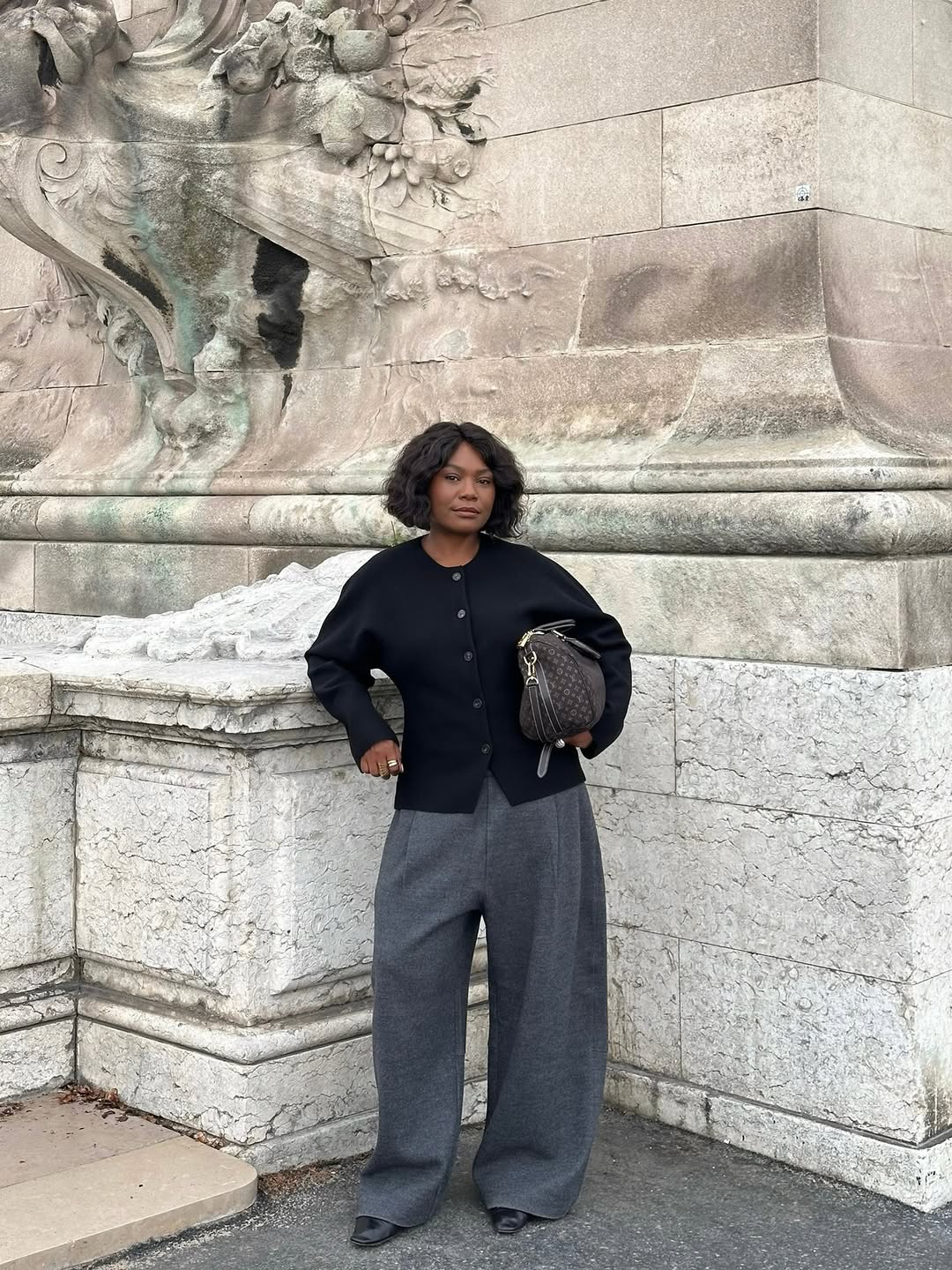 Franny wearing black cardigan