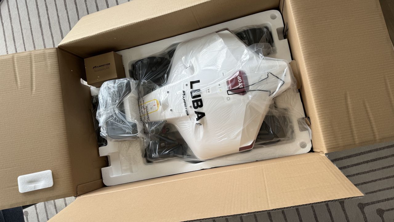 white robot mower