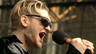Alice In Chains’ Layne Staley singing into a microphone onstage