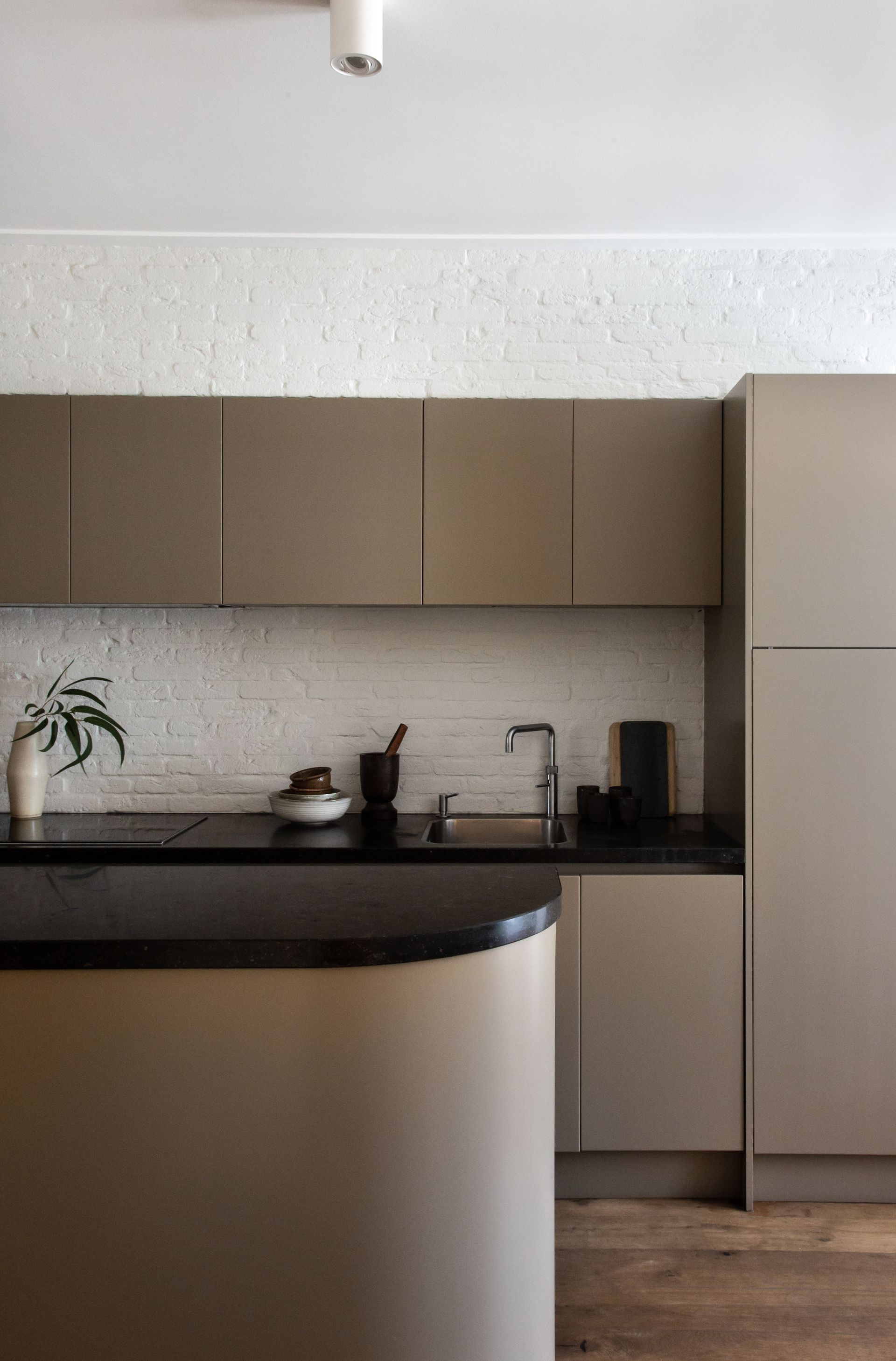 brown-painted kitchen cabinets