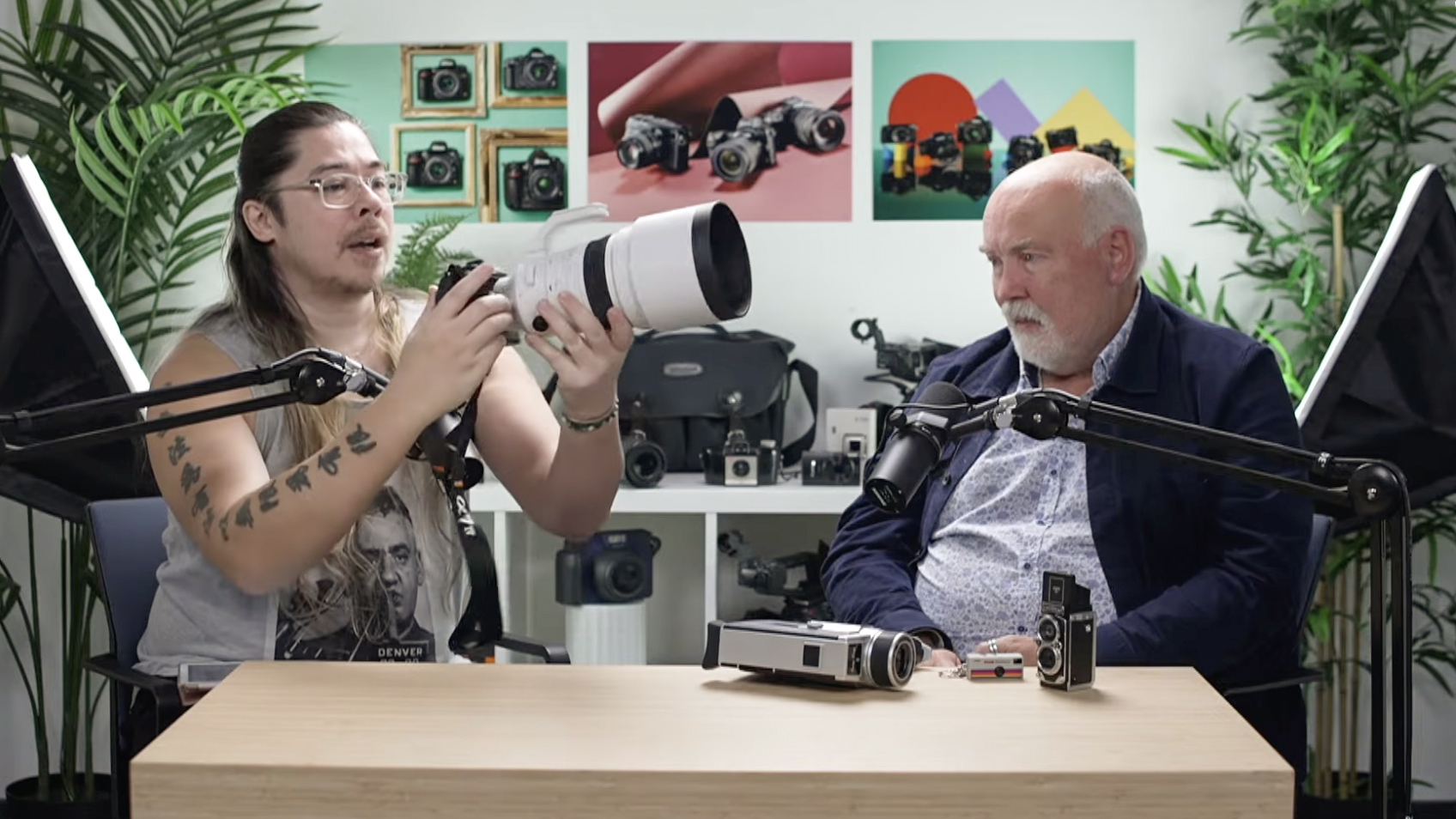 James Artaius holds the Sigma 200mm f/2 DG OS Sports lens on the Bokeh Face podcast, with cohost Chris George
