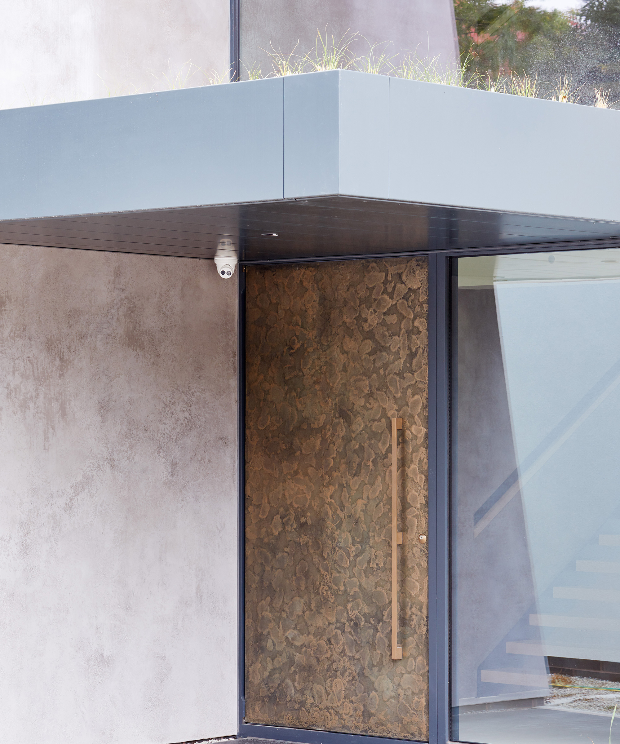 contemporary flat roofed porch with green roof