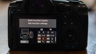 A menu on the back of a Canon EOS R5 showing how to set up the Multi-Function button