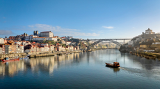 Tivoli Kopke Porto Gaia Hotel exterior with river.