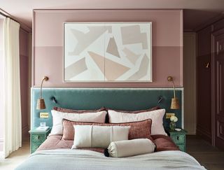 Pink bedroom with teal headboard