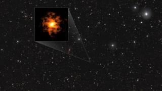 A large field of stars with a highlighted black box containing a glowing orange irregularly shaped blob