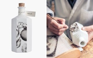 Left, a white bottle with straight sides, flowers painted on one panel and a cork lid. Right, a person painting flowers on the bottle with black paint.