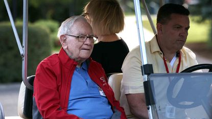 Berkshire Hathaway chairman Warren Buffett on a golf cart