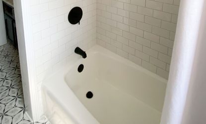 Refinished cast iron white tub 