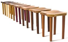 Different shades of wooden stools