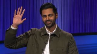 Hasan Minhaj waving to camera on Celebrity Jeopardy