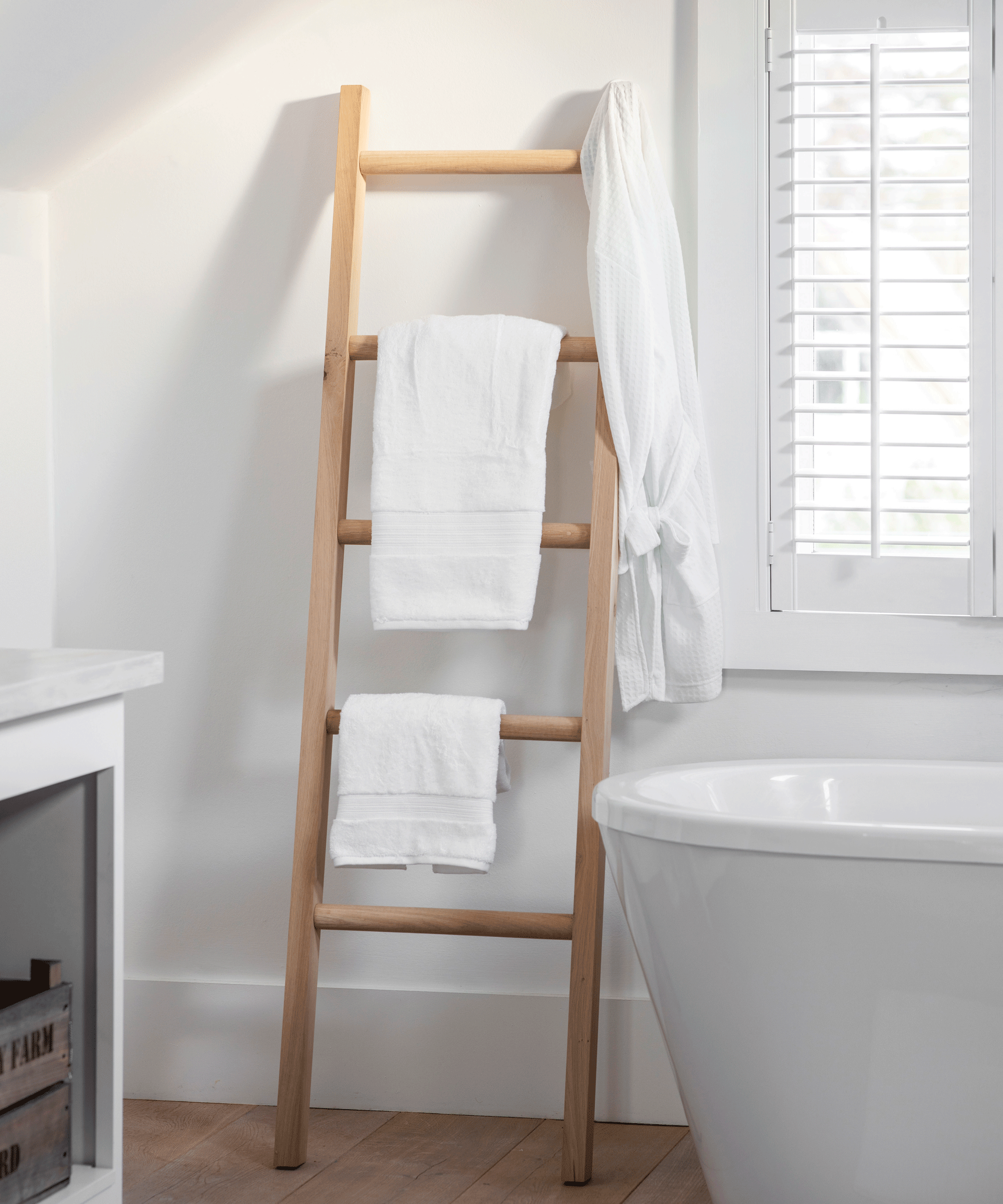 bathroom towels on ladder