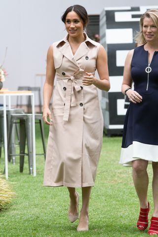 Meghan Markle in a beige shirt dress