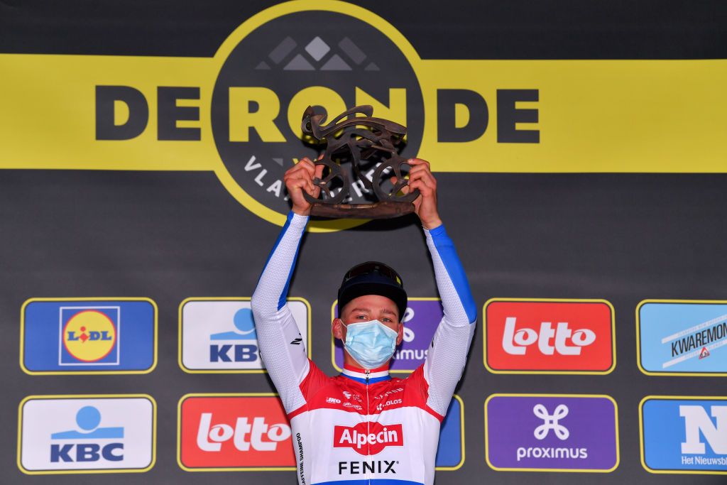 OUDENAARDE BELGIUM OCTOBER 18 Podium Mathieu Van Der Poel of The Netherlands and Team AlpecinFenix Celebration Trophy Mask Covid safety measures during the 104th Tour of Flanders 2020 Ronde van Vlaanderen Men Elite a 2433km race from Antwerpen to Oudenaarde RVV20 FlandersClassic on October 18 2020 in Oudenaarde Belgium Photo by Luc ClaessenGetty Images