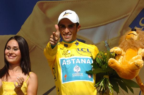 Alberto Contador (Astana) fires one off from the podium