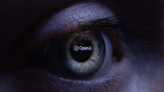 This illustration photograph taken with a macro lens shows an 'OpenAI' logo reverse projected onto a human eye at a studio in Paris on June 6, 2023.