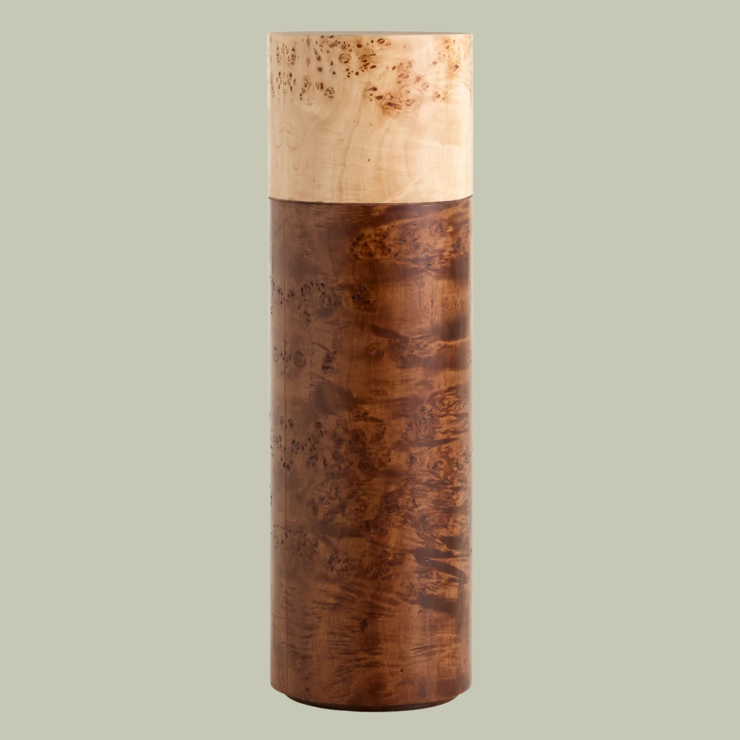 A mixed burl wood plant pedestal