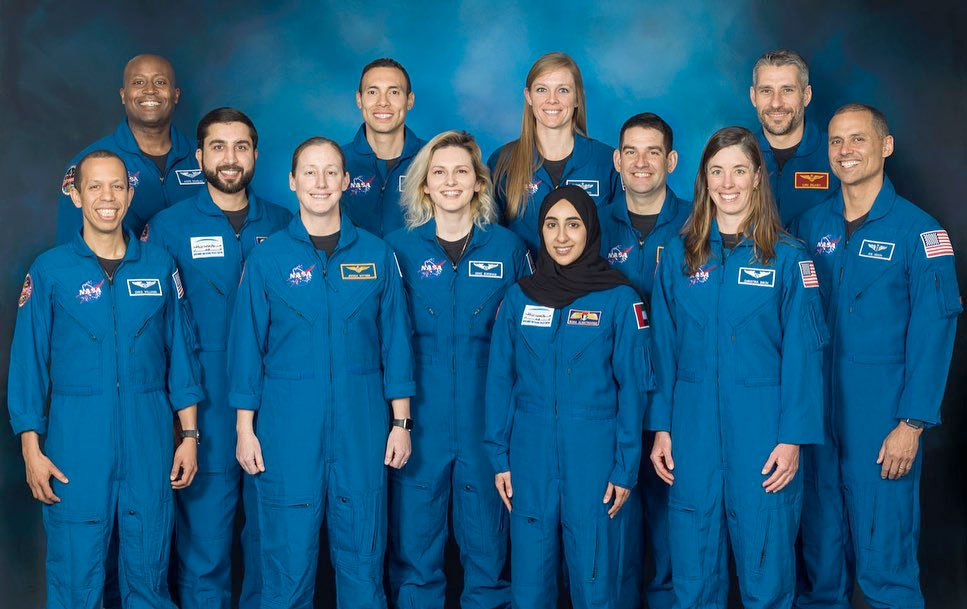 "The Flies," or NASA's 23rd class of astronaut candidates, from left: Christopher Williams, Andre Douglas, Mohammad Al Mulla, Jessica Wittner, Marcos Berríos, Deniz Burnham, Nichole Ayers, Nora Al Matrooshi, Jack Hathaway, Christina Birch, Luke Delaney and Anil Menon.