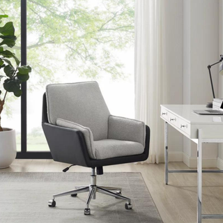 A two-toned gray desk chair.