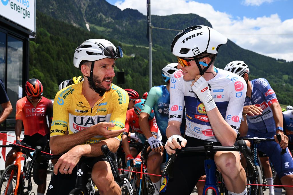AMBRI SWITZERLAND JUNE 13 LR Adam Yates of The United Kingdom and UAE Team Emirates Yellow leader jersey Mattias Skjelmose of Denmark and Team Lidl Trek White best young jersey during the 87th Tour de Suisse 2024 Stage 5 a 1486km stage from Ambri to Cari 1636m UCIWT on June 13 2024 in Ambri Switzerland Photo by Tim de WaeleGetty Images