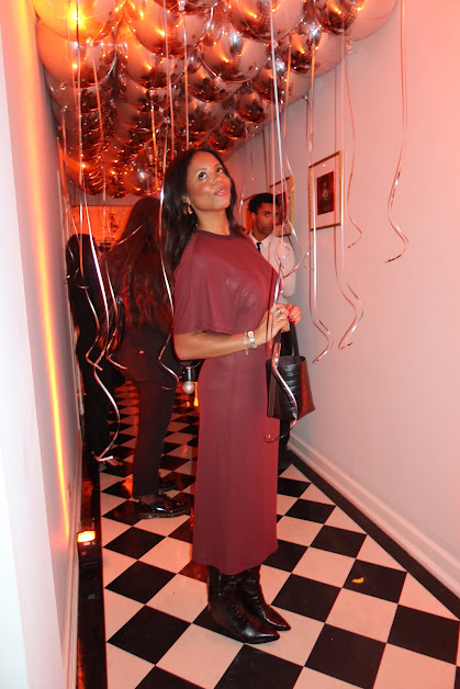Sierra Mayhew wearing a croc-embossed handbag.
