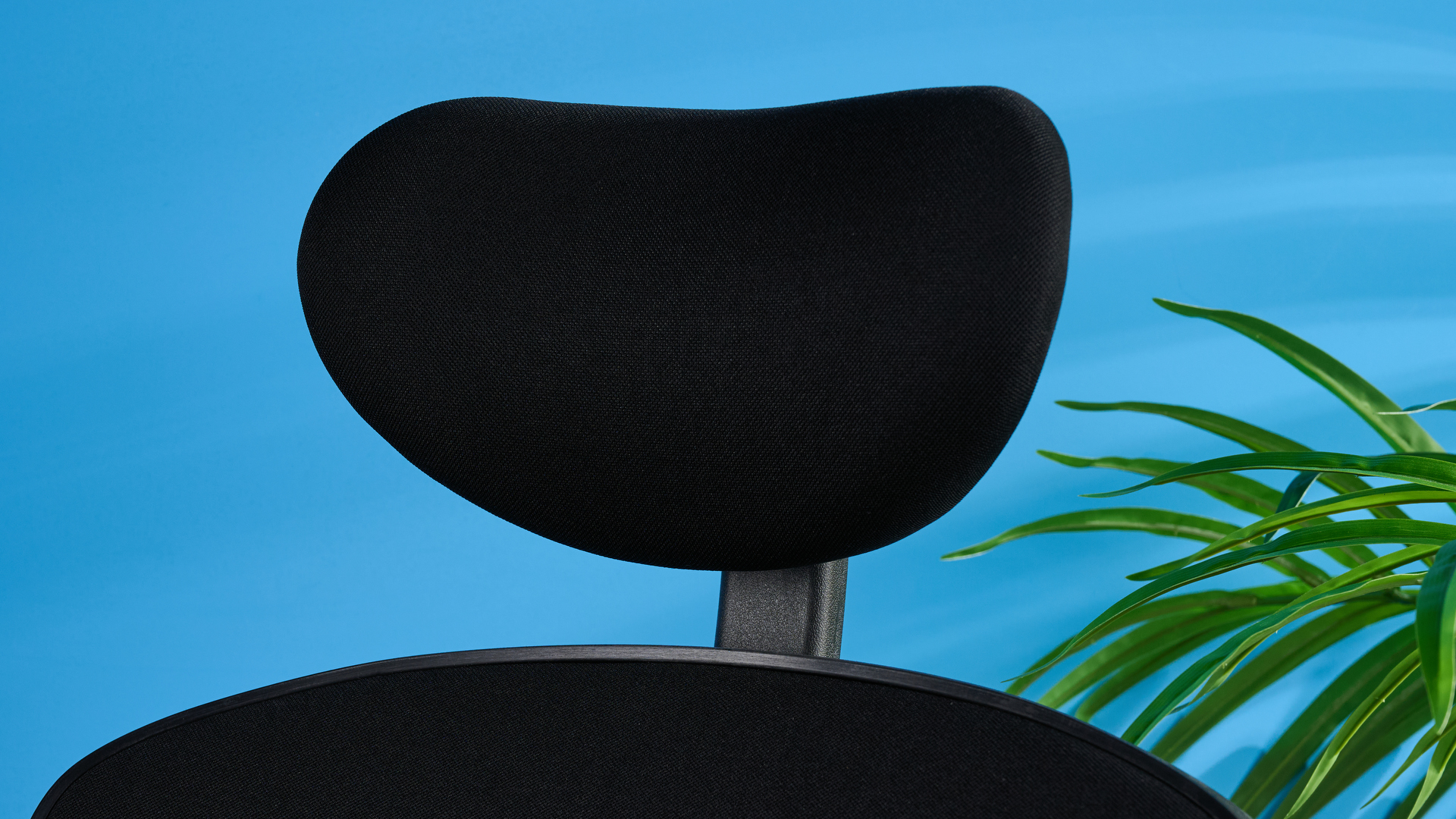 A black Boulies OP300 ergonomic office chair
